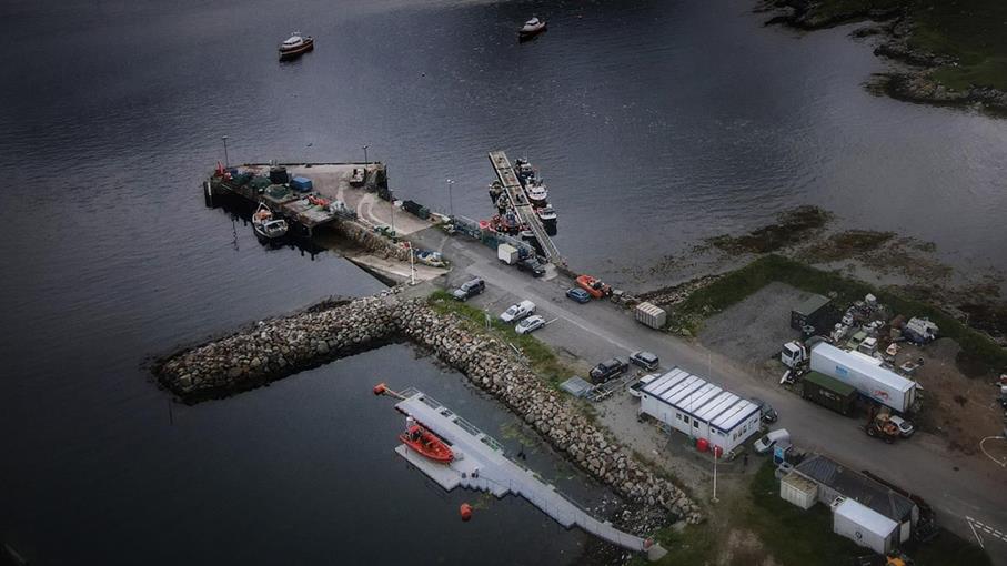 An aerial view of Leverburgh Lifeboat Station with their B class lifeboat on its floating pontoon