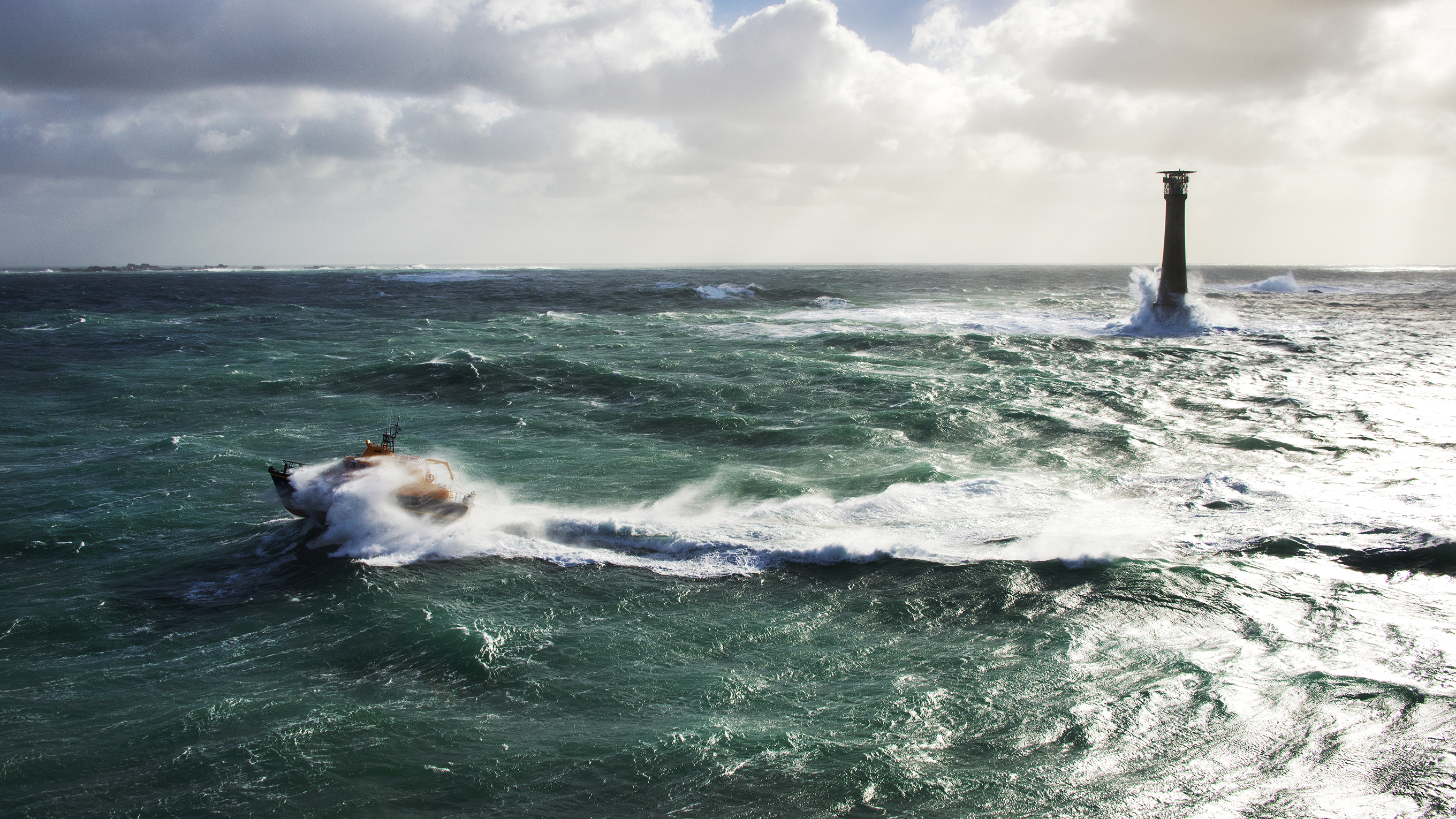A lighthouse in rough seas