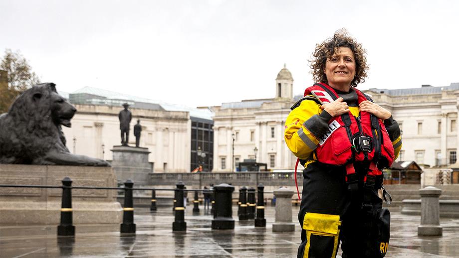 Female crew member stands in Trafalgar square for RNLI's 200 Appeal