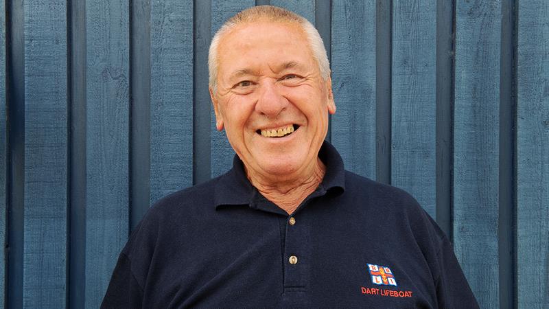 Dart RNLI Fundraiser Rob Clements smiling into camera