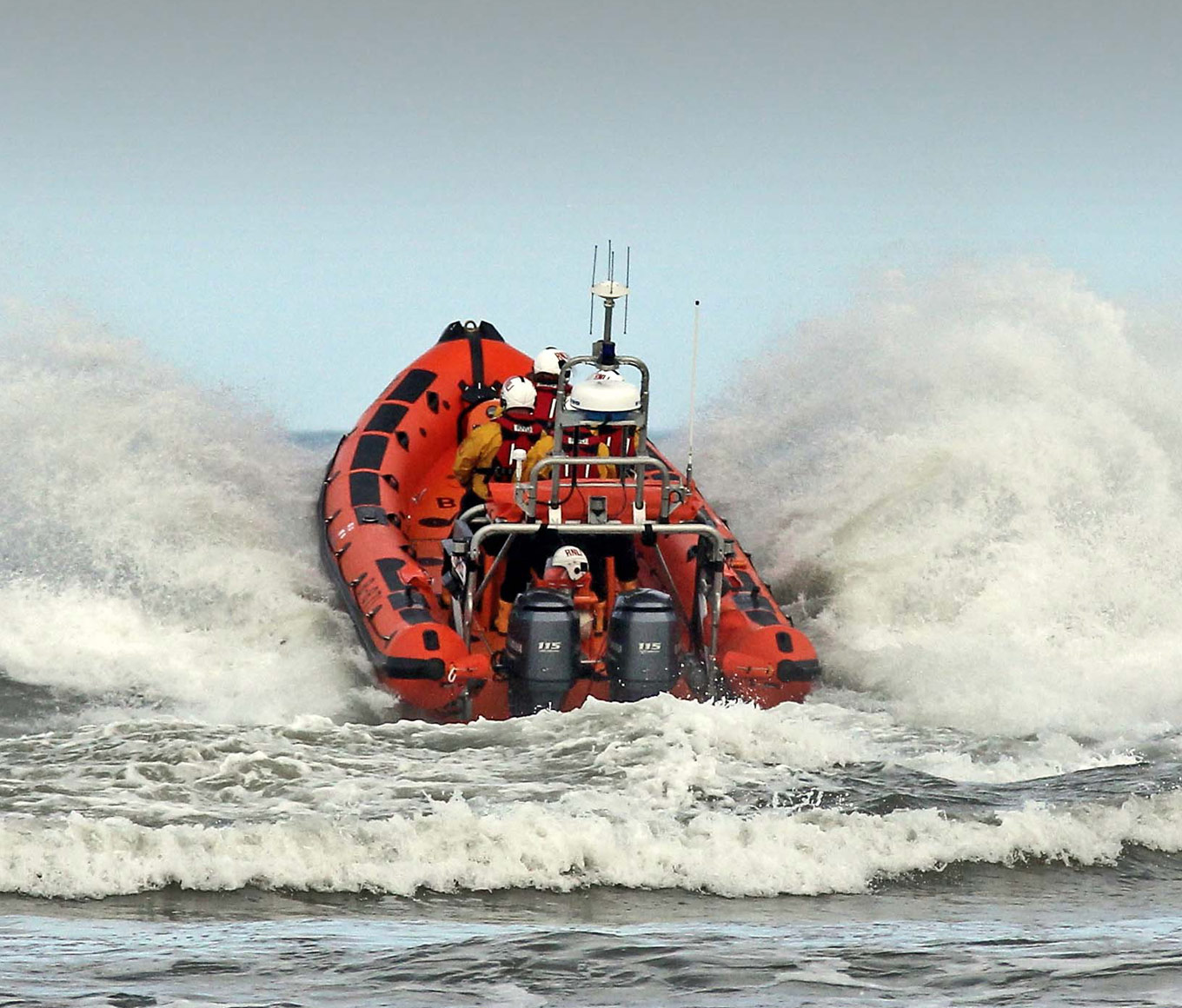 B class lifeboat breaking through heavy surf