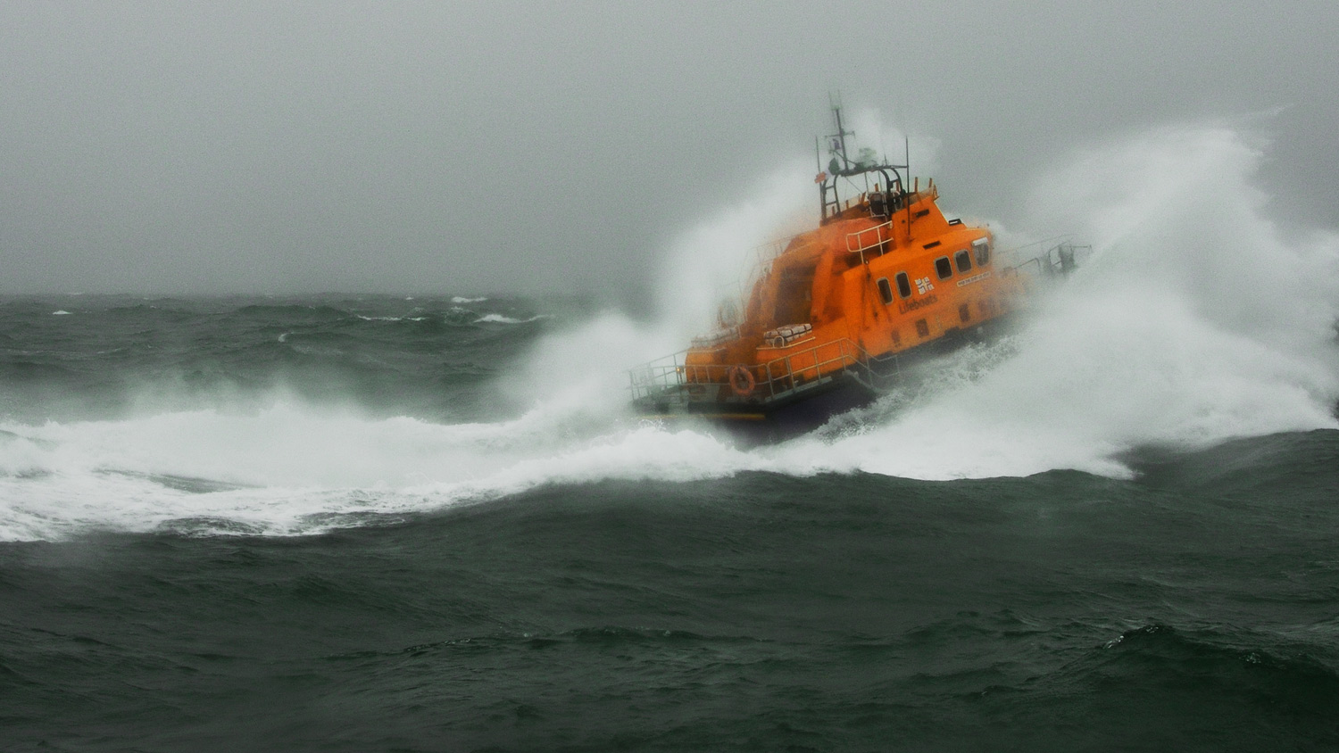 Severn class lifeboat breaks through a wave